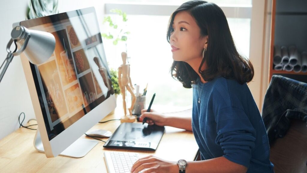 Woman at desk working on computer